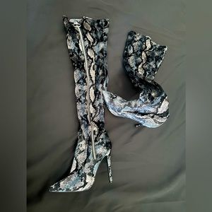 Thigh high suede snack print boots, never worn!